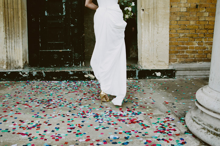 Lower half of a bride wearing a Vivienne westwood wedding dress